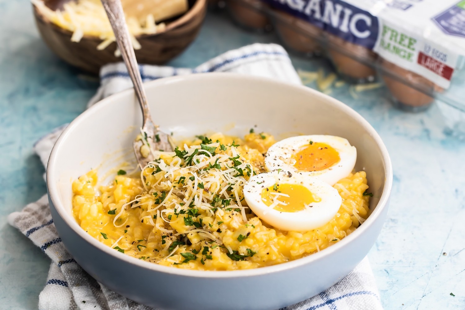 Perfectly tender butternut squash risotto topped with a dash of Parmesan and a 6 minute soft-boiled Pete and Gerry's Organic Egg.