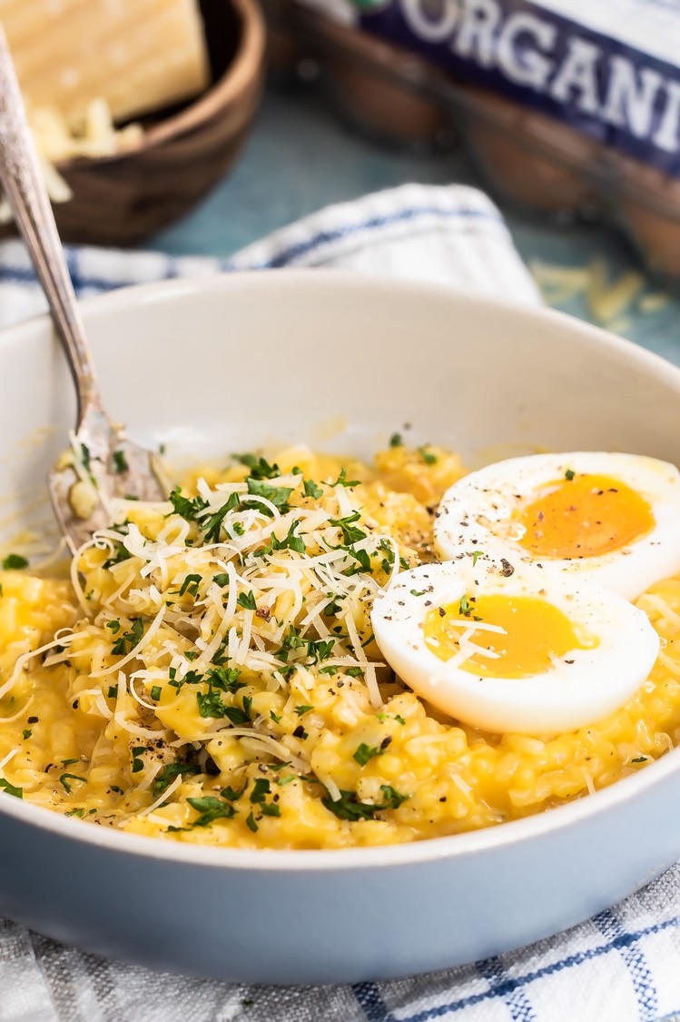 Perfectly tender butternut squash risotto topped with a dash of Parmesan and a 6 minute soft-boiled Pete and Gerry's Organic Egg.