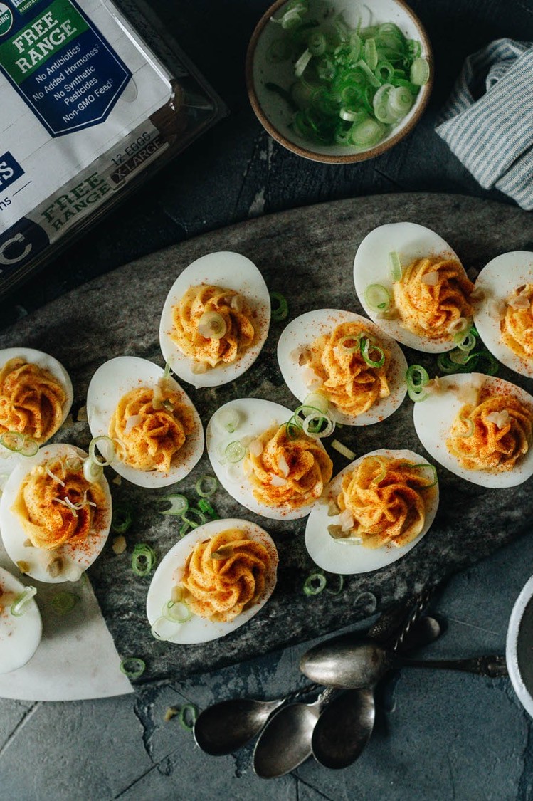 Filled with a yolky mixture of wasabi mayo, Chinese pickled mustard greens, and rice vinegar, these unique Chinese deviled eggs are an ideal marriage of richness and acidity.