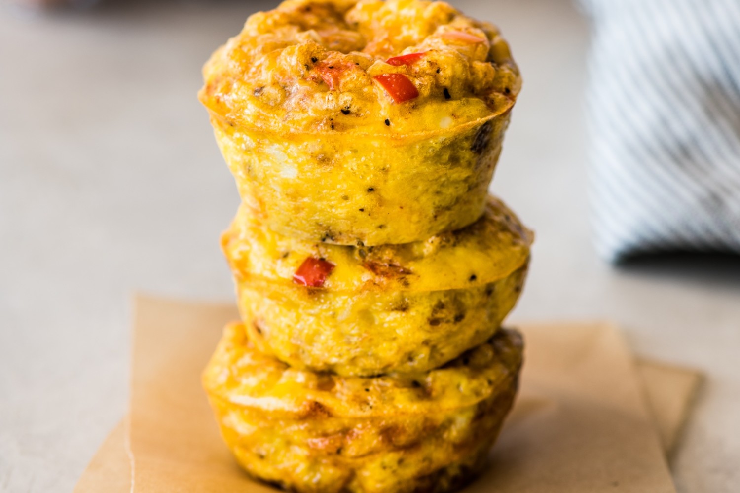 Keto-friendly fajita egg cups filled with bell peppers, mozzarella cheese, and ground cumin. A great on-the-go snack. | peteandgerrys.com 