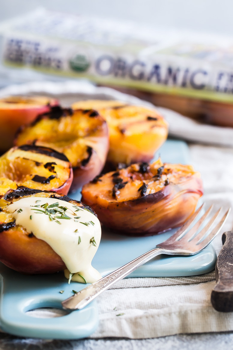 This grilled peach and zabaglione is a perfect on the grill recipe during your summer BBQ. This dish features Pete and Gerry's Organic Eggs. | peteandgerrys.com 