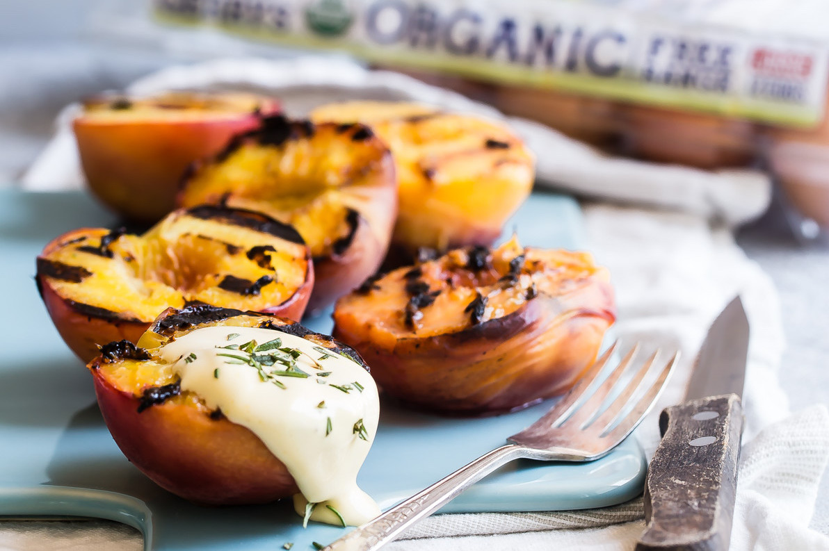 This grilled peach and zabaglione is a perfect on the grill recipe during your summer BBQ. This dish features Pete and Gerry's Organic Eggs. | peteandgerrys.com 