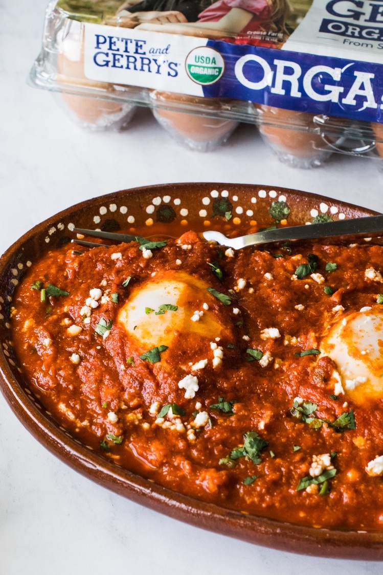 Huevos ahogados (or "drowned eggs"). Pete and Gerry's Organic Eggs gently poached in a smooth, smoky red salsa made from toasted guajillo chiles, chile de arbol, Roma tomatoes, and Mexican oregano.