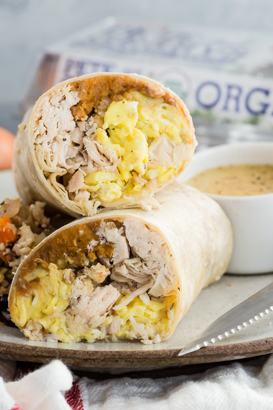 This leftovers breakfast burrito is stuffed with scrambled eggs, turkey, sweet potato mash, and gravy. | peteandgerrys.com 