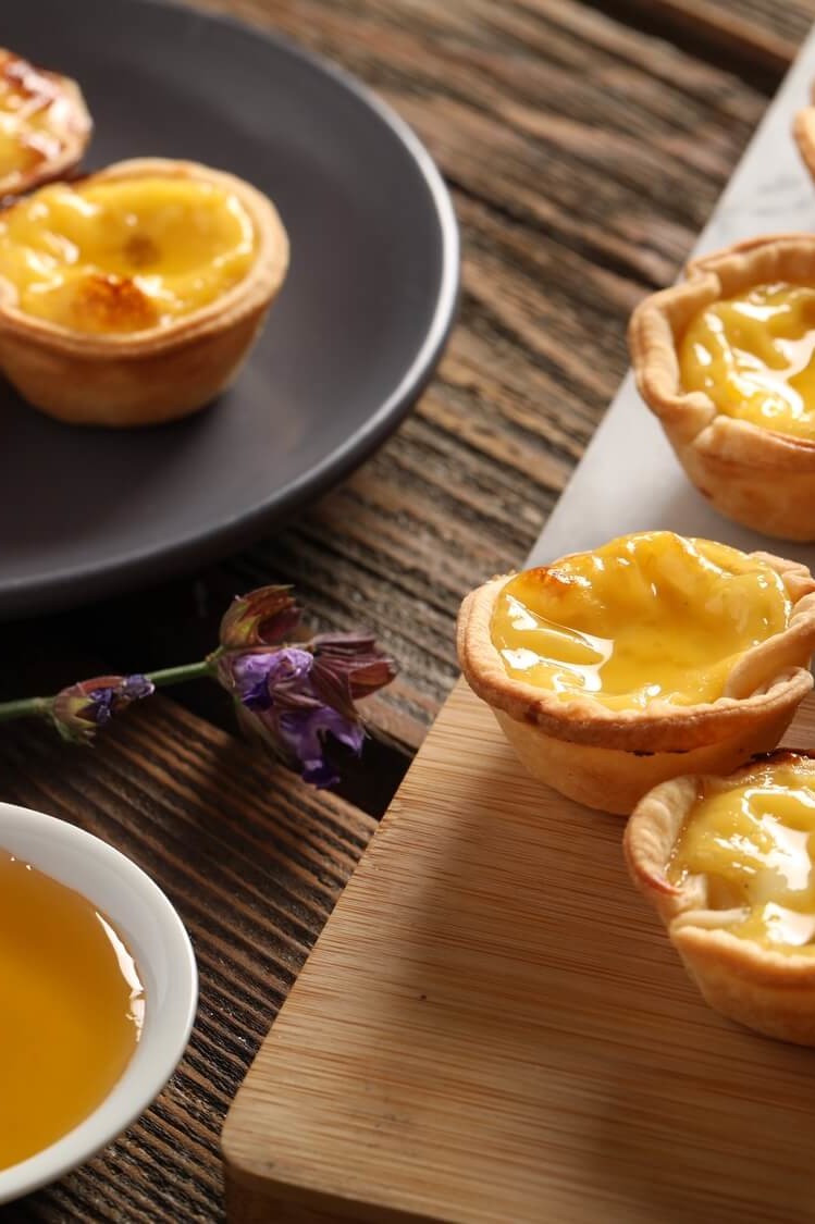 Recipe for Chinese egg tarts created by Chef Edward Lee. These sweet and savory puff pastry bites are filled with eggs, evaporated milk, and honey. | peteandgerrys.com 