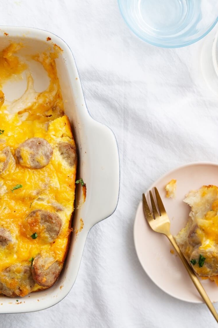 This breakfast casserole is a true family farm favorite. It features biscuits, sausage, cheddar cheese, and eggs. A filling meal for the family. | peteandgerrys.com