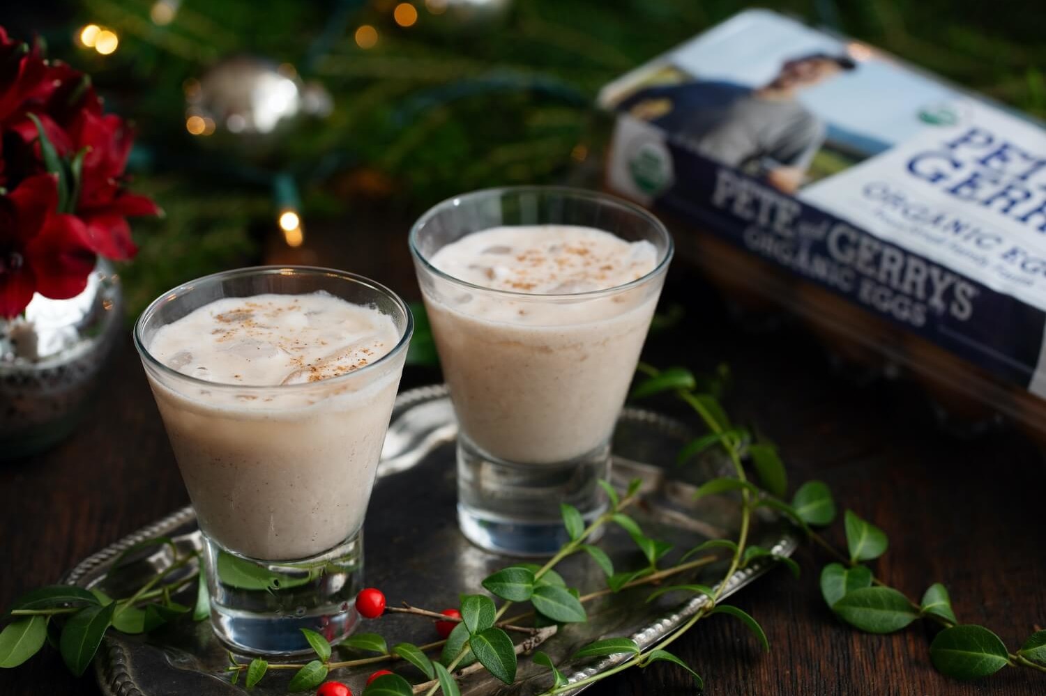 Dairy-free eggnog made with almond milk, coconut milk, egg whites, and maple syrup. Can be mixed with rum for a big batch party drink. | peteandgerrys.com 