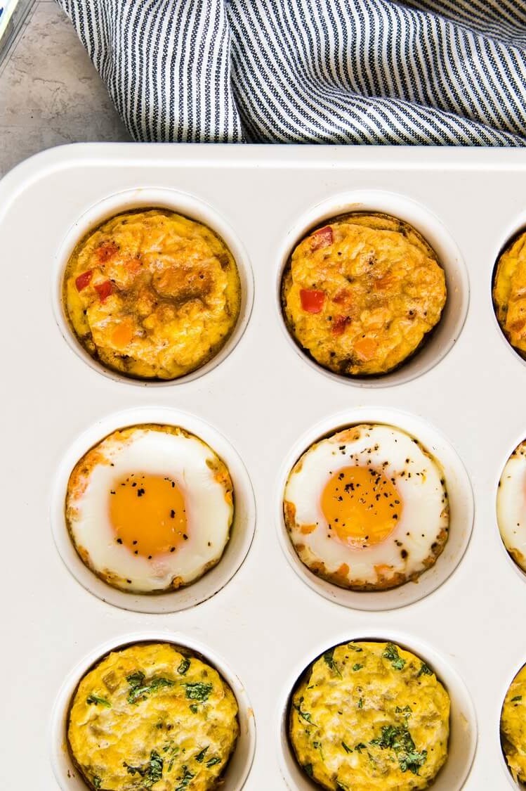 Quick and easy egg bites prepared in a sheet pan. These protein-packed bites are filled with a variety of flavorful and healthy fillings. | peteandgerrys.com