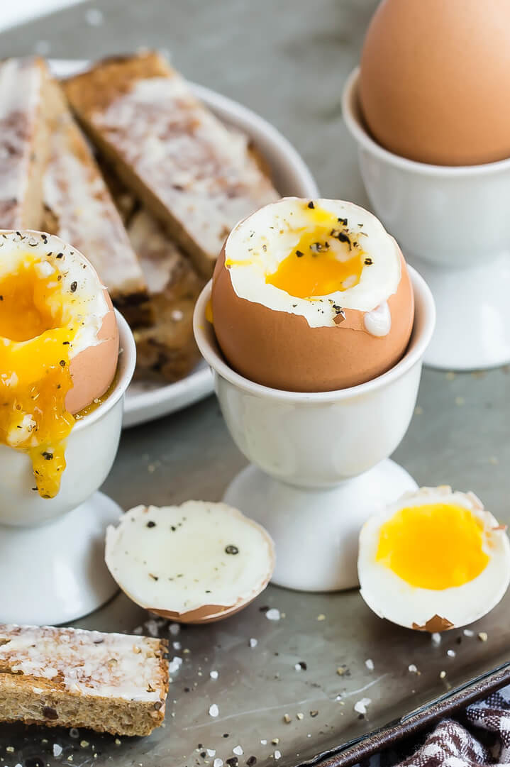 Eggs and soldiers, a dish that consists of generously buttered golden brown toast sticks and soft boiled eggs for dipping. | peteandgerrys.com