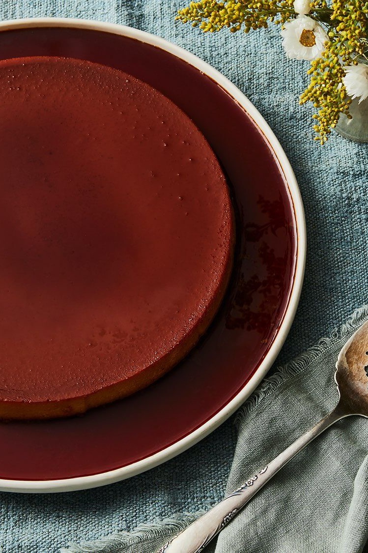 This golden milk flan is an easy dessert that you can make in advance. It features sweetened condensed milk and organic eggs. This flan has a perfect copper brown top because of the inclusion of cinnamon and turmeric. | peteandgerrys.com 