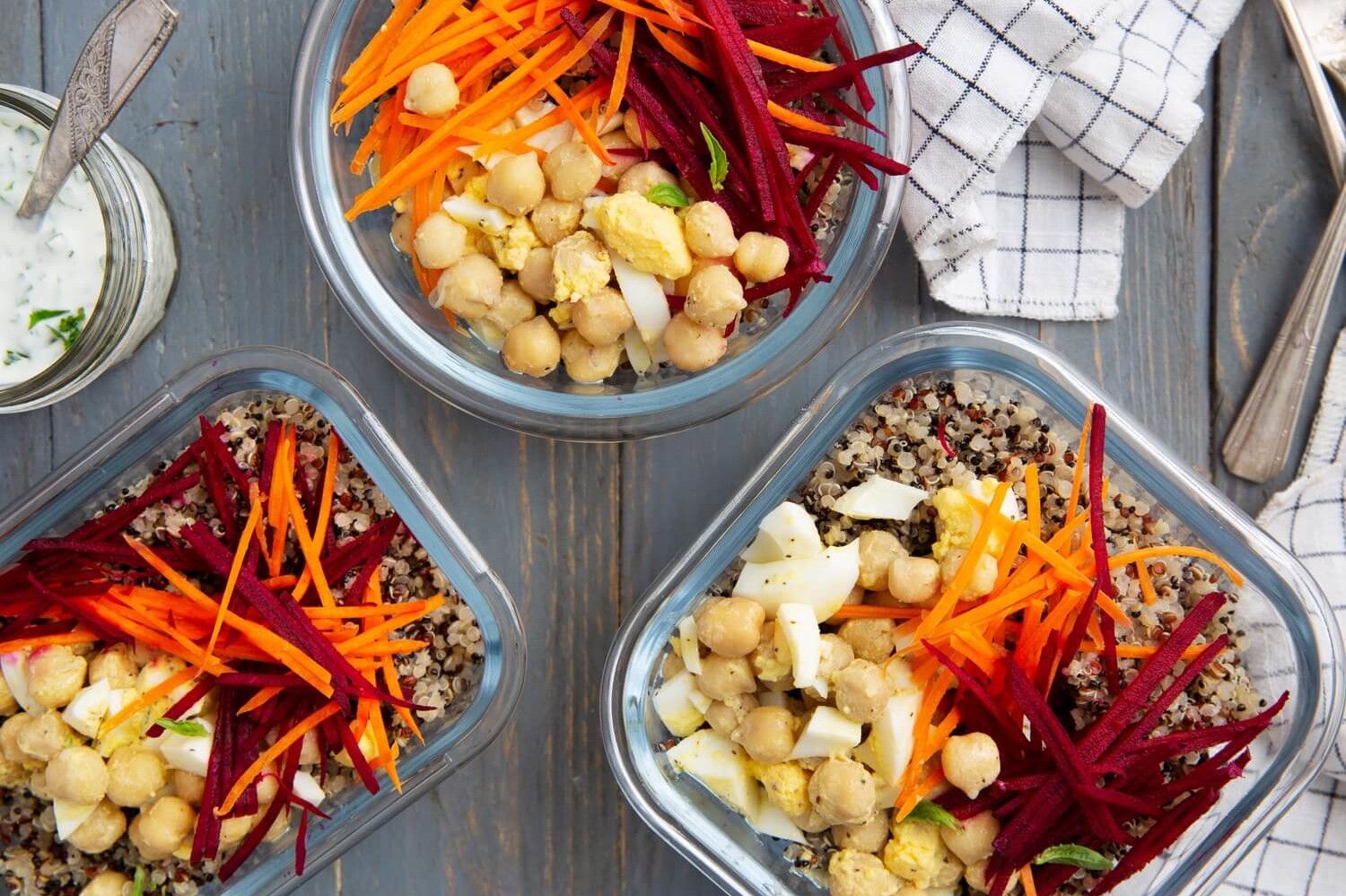 These Mediterranean bowls are the perfect make-ahead meal. They feature quinoa, hard-boiled eggs, carrots, beets, chickpeas, and a greek yogurt dressing. | peteandgerrys.com 