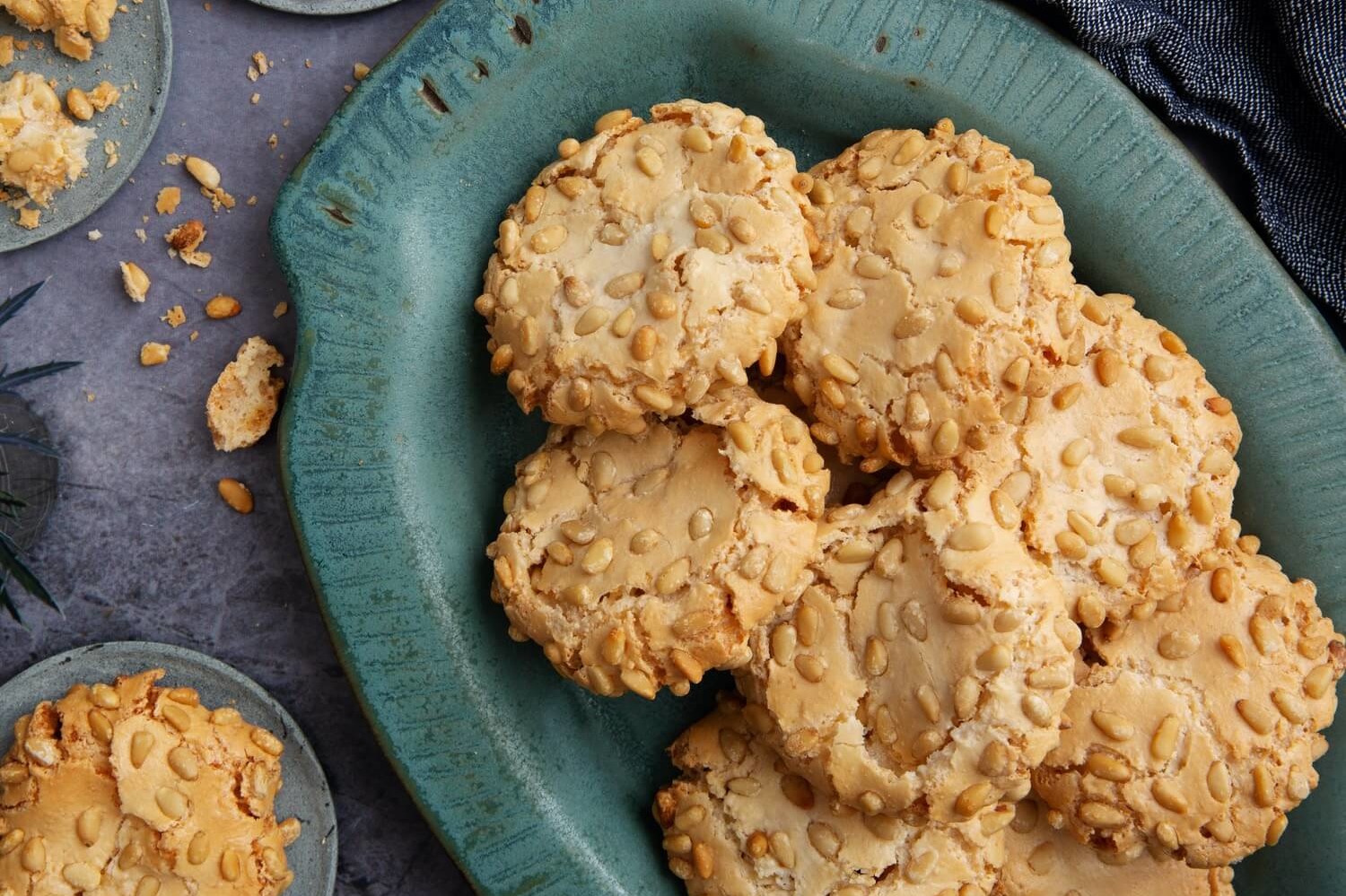 These pignoli cookies are less than five ingredients and are delicious. They feature almond flour, confectionery sugar, organic egg whites, and pine nuts. | peteandgerrys.com 