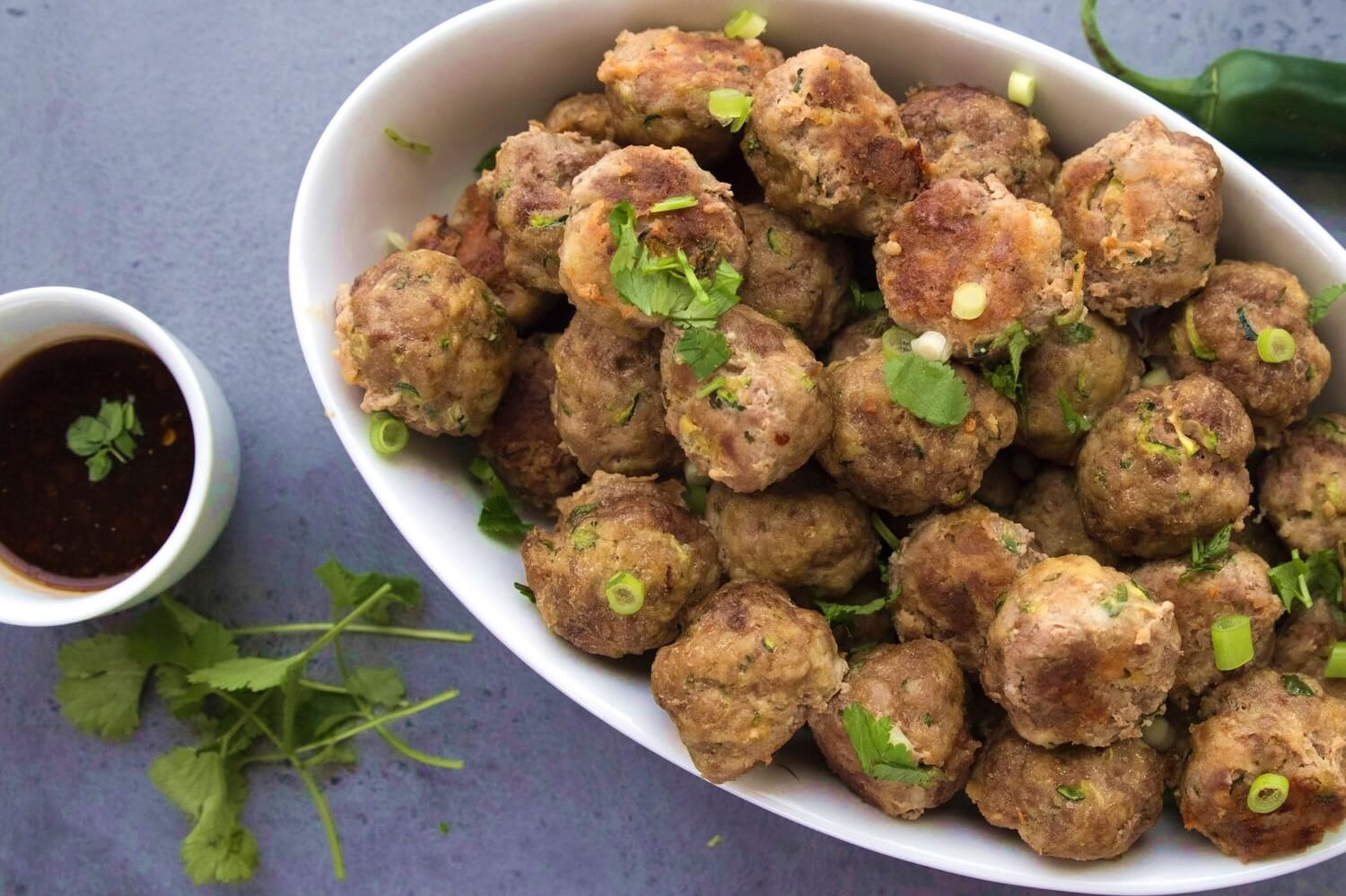 These keto Thai meatballs are perfect for any party as an appetizer or with pasta for dinner. These meatballs have a delicious Asian inspired flavor. 