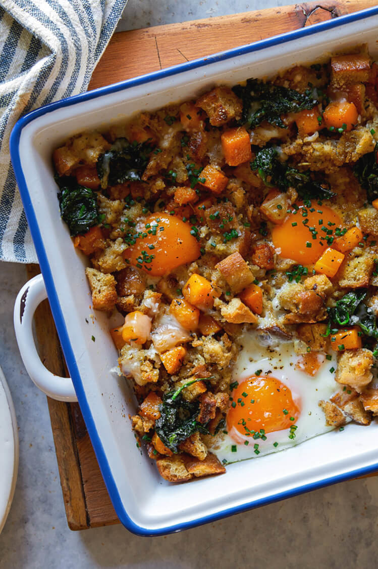 This Thanksgiving leftover hash is a mix of stuffing, swiss cheese, sautéed spinach, fresh herbs, and runny eggs. | peteandgerrys.com 