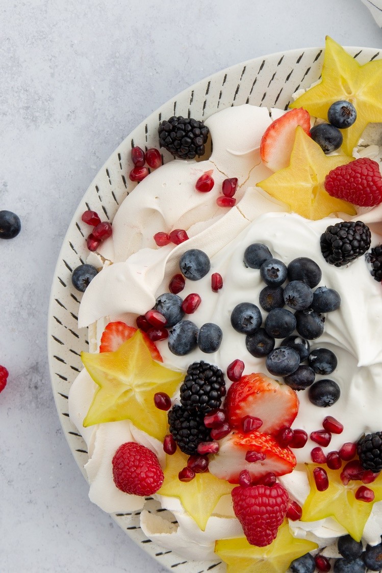 This pavlova is a great starter for any season dessert. The meringue is easy to whip up and the filling is superb. This recipe features organic egg whites, fresh fruit, and superfine sugar. | peteandgerrys.com 