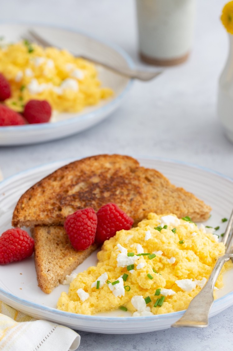 This is not your average scrambled eggs. Our scrambled eggs are mixed with a few dollops of plain yogurt, goat cheese, and fresh herbs. Then cooked to perfection. | peteandgerrys.com 