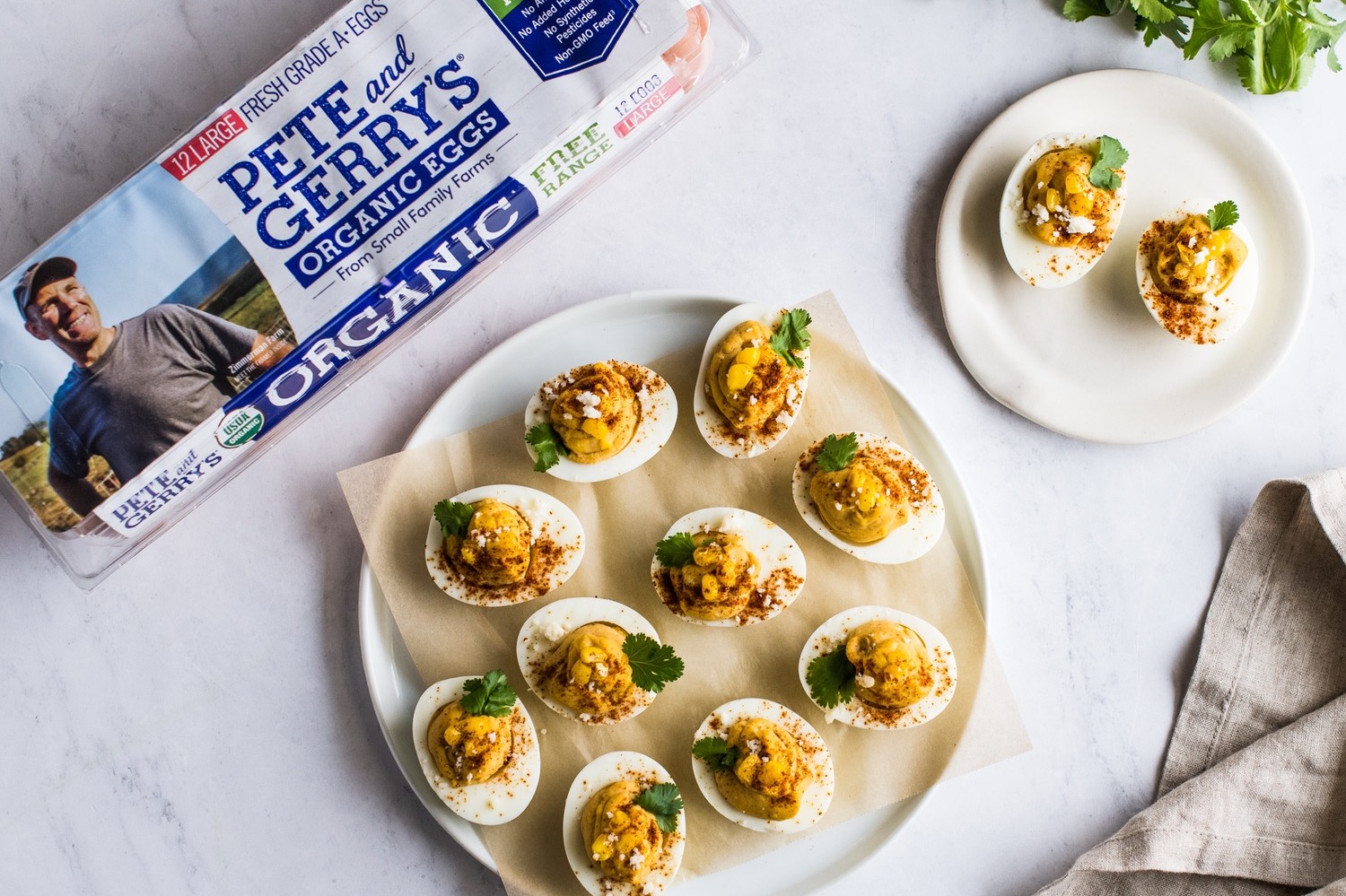 Mexican street corn inspired deviled eggs recipe made with cotija cheese, chili powder, and creamy mayonnaise. | peteandgerrys.com