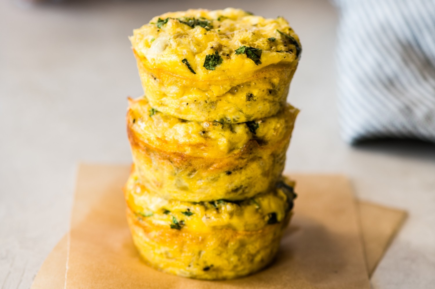 These Verde breakfast egg bites are filled with delicious organic eggs, green chiles, mozzarella cheese, and cilantro. Serve with tobasco or sour cream. | peteangerrys.com 